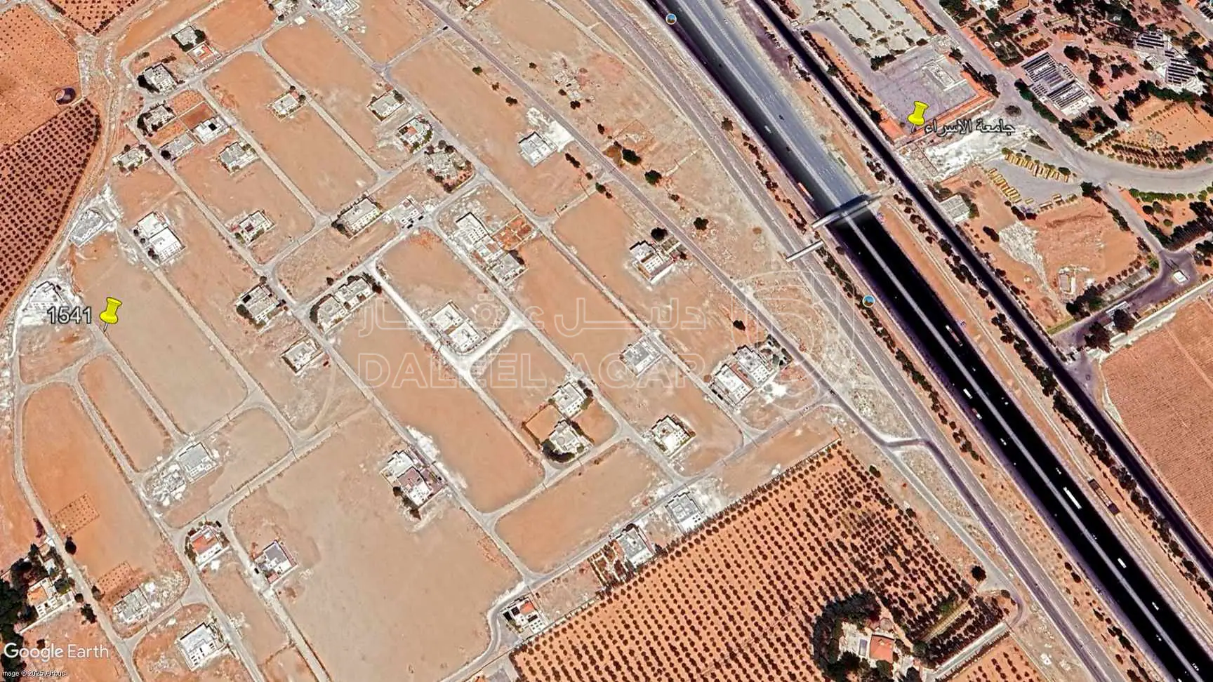 أرض في الطنيب مقابل الجامعه - 100,000 دأ - صورة 1
